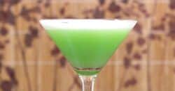 Bright green Absinthe Suissesse in cocktail glass