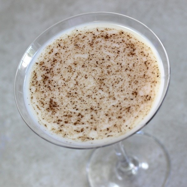 Tilted angle view of Almond Grove cocktail sprinkled with nutmeg