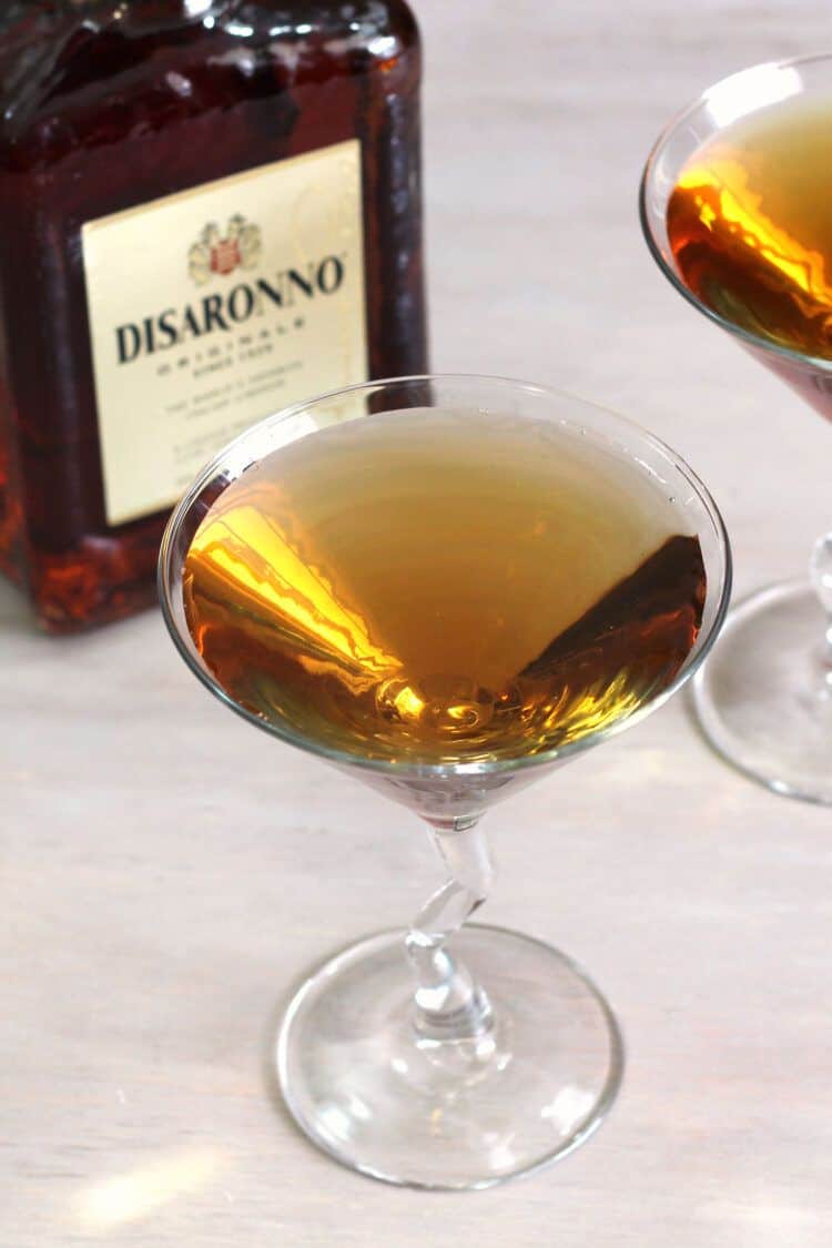 Amaretto cocktails in front of bottle