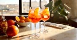 Two Aperol Spritz cocktails on a table