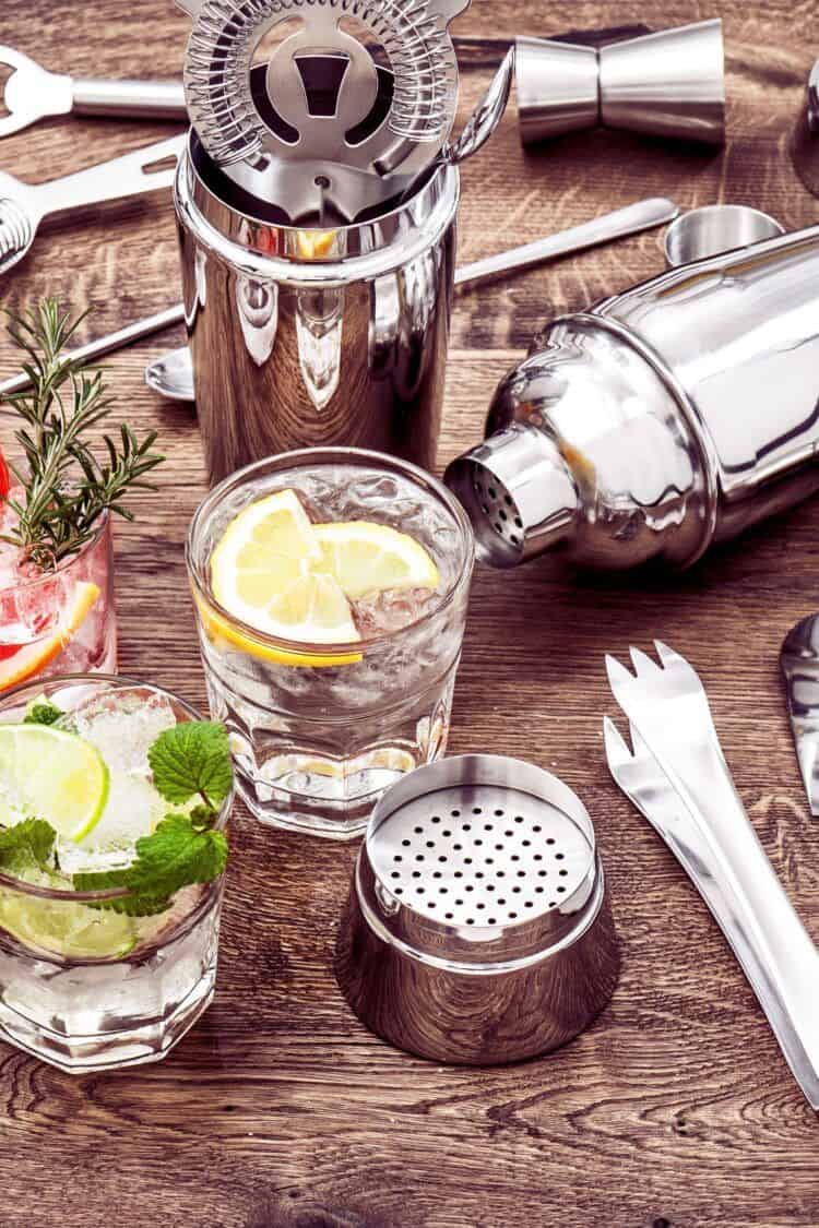 Bartender kit on table with drinks