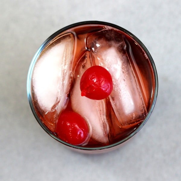 Overhead view of Beautiful One drink with cherries