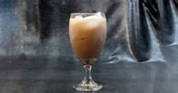 Belgian Brownie drink in goblet with ice