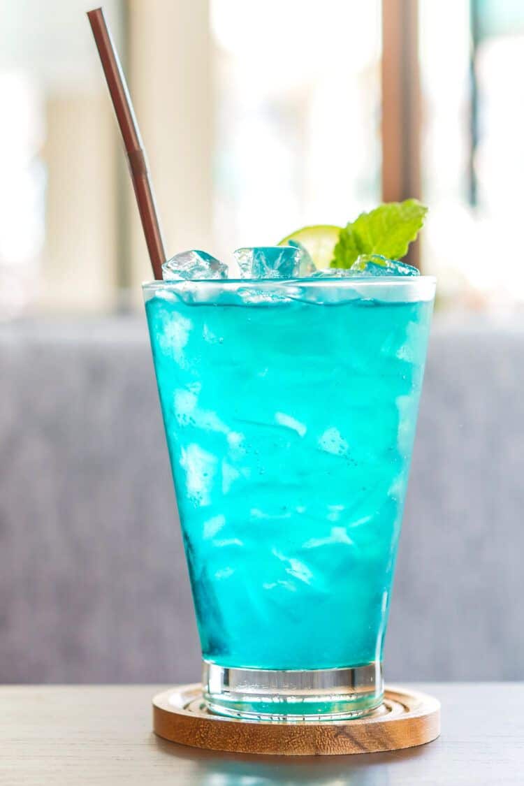 Blue Long Island Iced Tea sitting on coffee table in living room