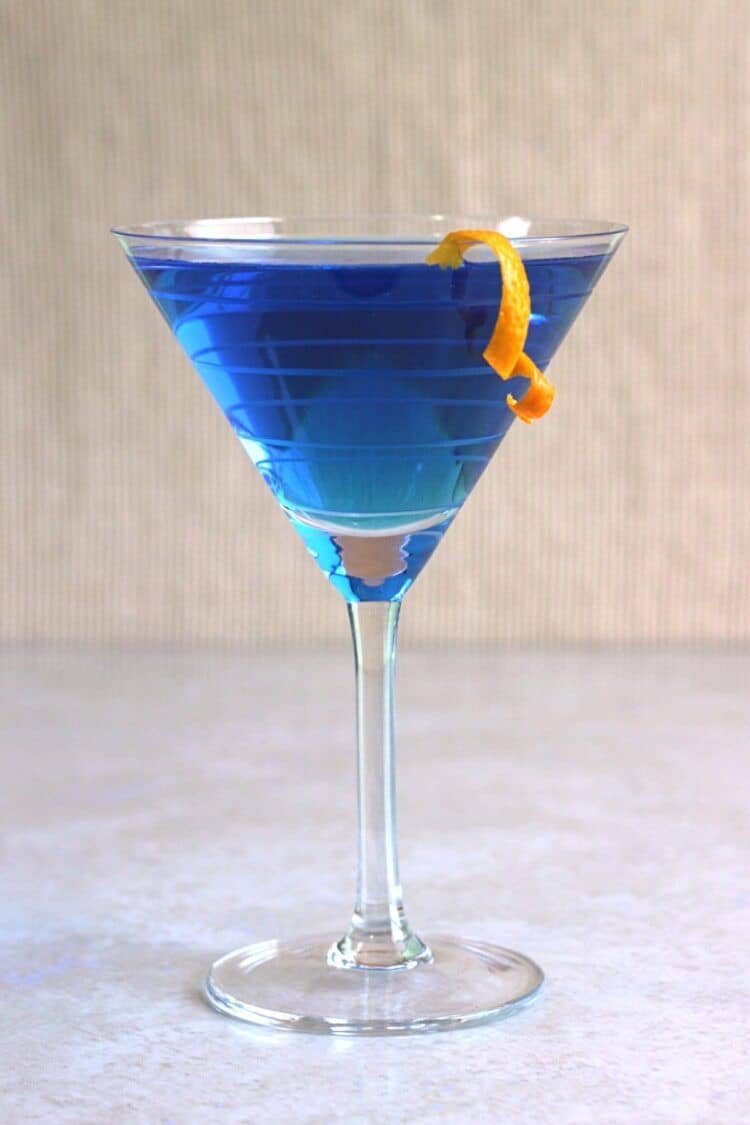 Blue Monday drink with orange twist