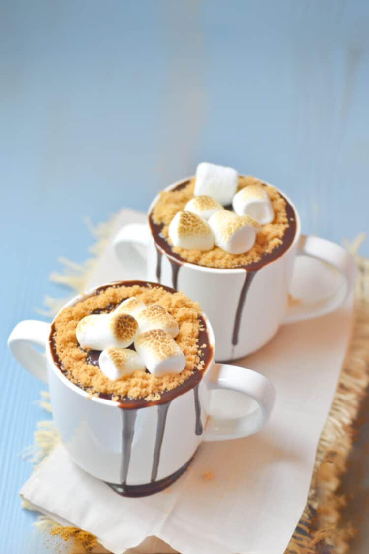 Boozy S’mores Hot Cocoa drink with marshmallows and graham cracker