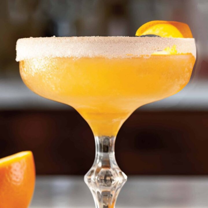 Brandy Crusta cocktail in coupe with orange twist