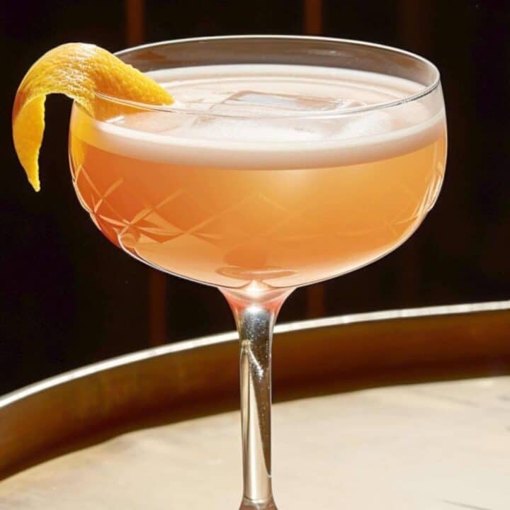 Brown Derby cocktail with grapefruit twist in coupe glass