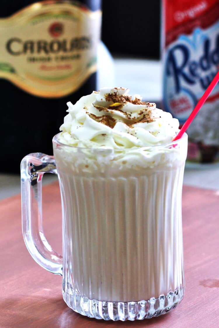 Butterscotch Coffee Cocktail with whipped cream and nutmeg sprinkles