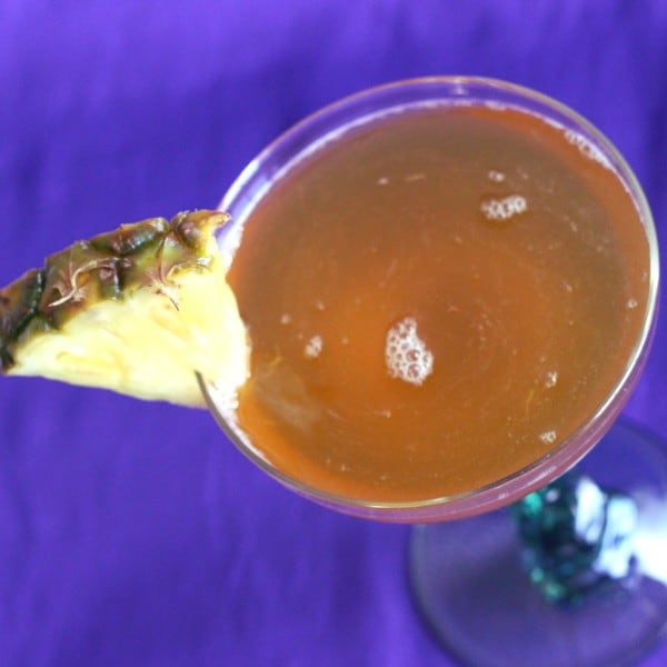 Tilted angle view of Cactus Bowl drink with pineapple wedge