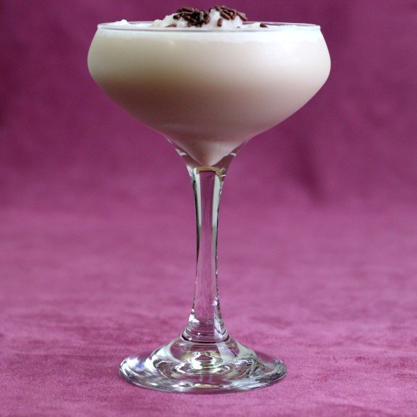 Full-length view of Checkerboard cocktail with chocolate sprinkles on top