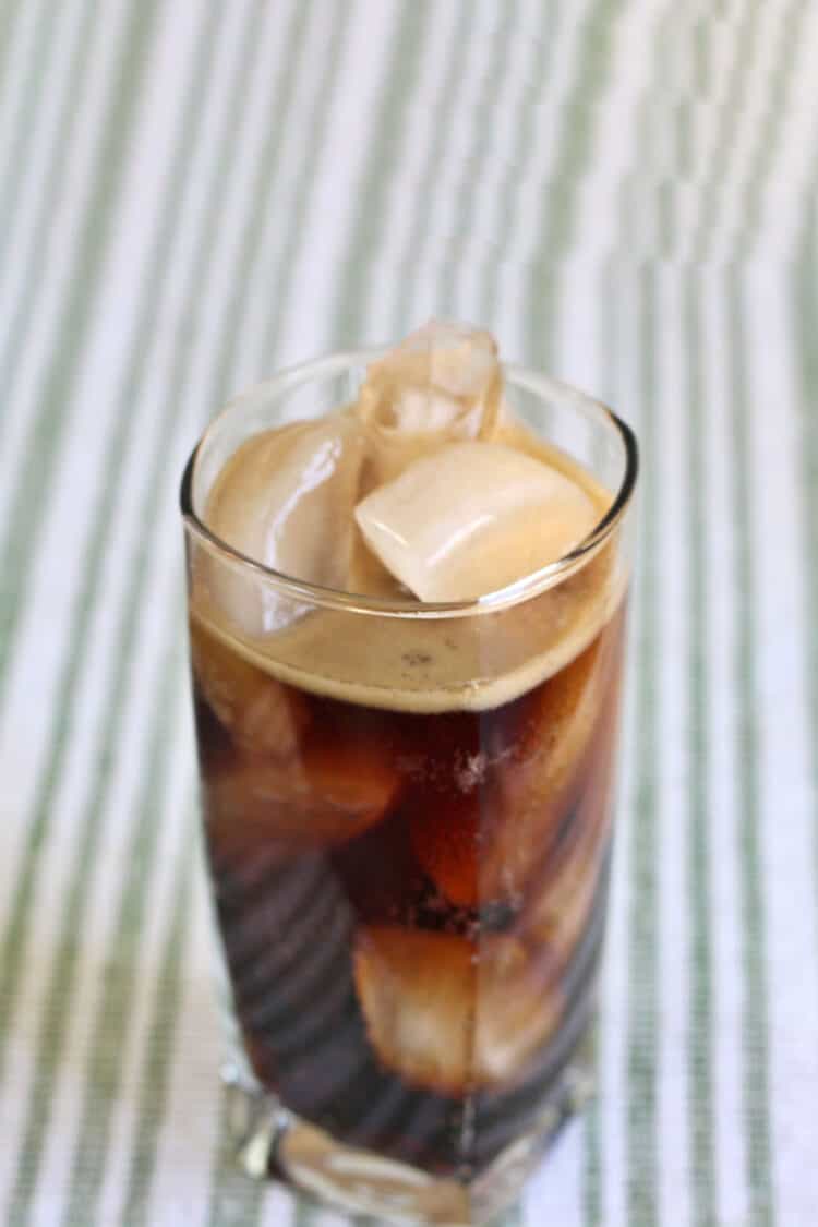 Chocolate Coke cocktail in tall glass with ice
