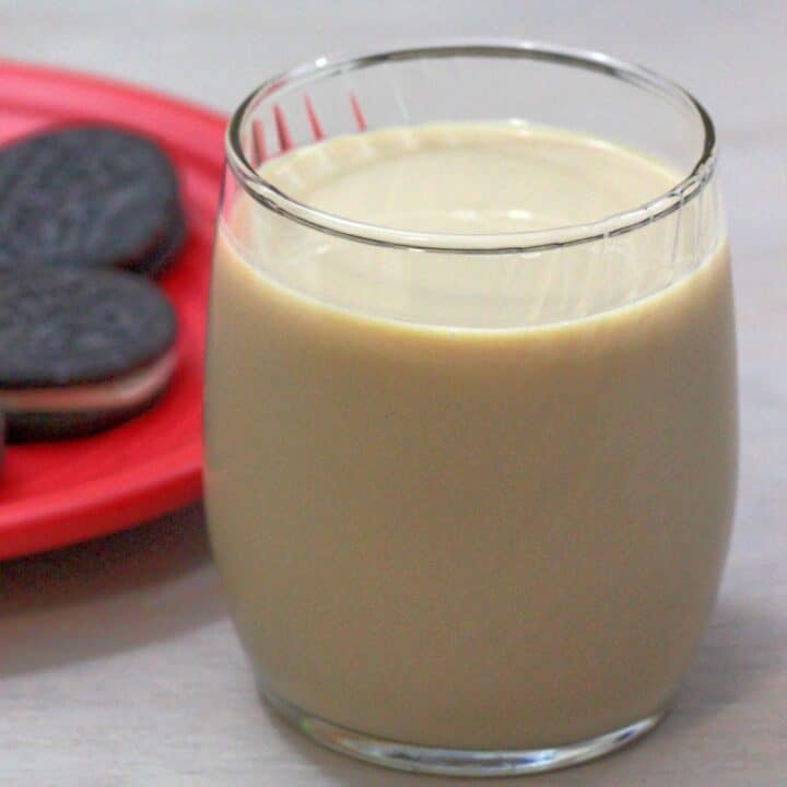 Christmas Cookie cocktail on saucer with cookies