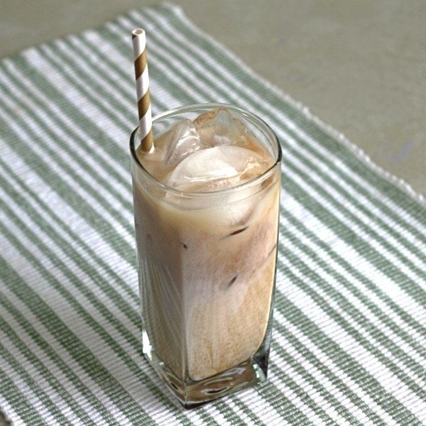 Angled view of Coco Butter drink in tall glass with ice