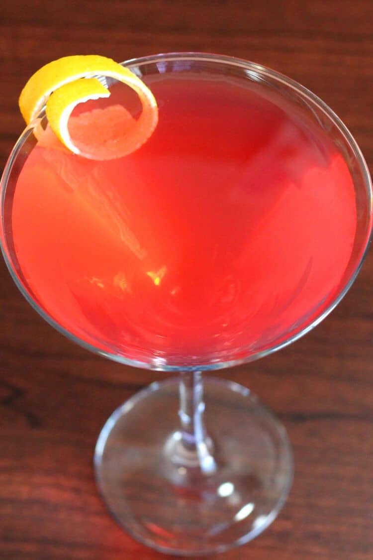 Overhead shot of Cosmopolitan cocktail with lemon twist