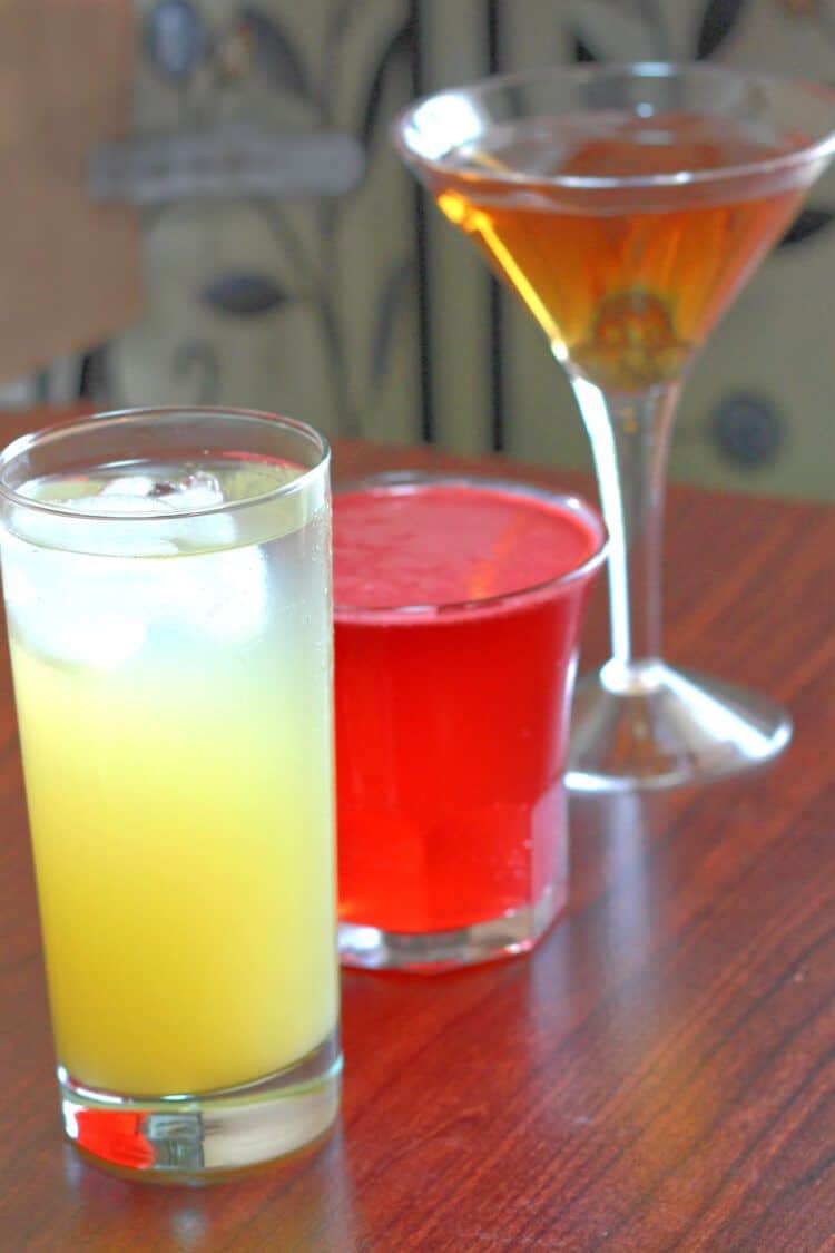 Three cocktails on bar top