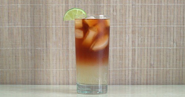 Dark 'n' Stormy cocktail with yellow and brown layered effect