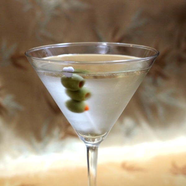 Dirty Martini drink with olives