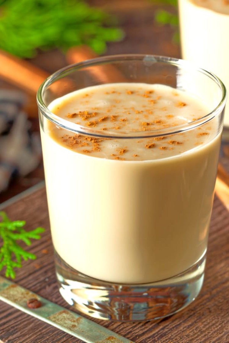 Eggnog cocktail with nutmeg sprinkles