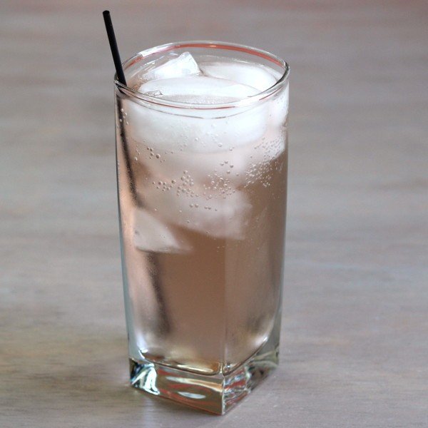 Even Pair drink in tall glass with ice on table top