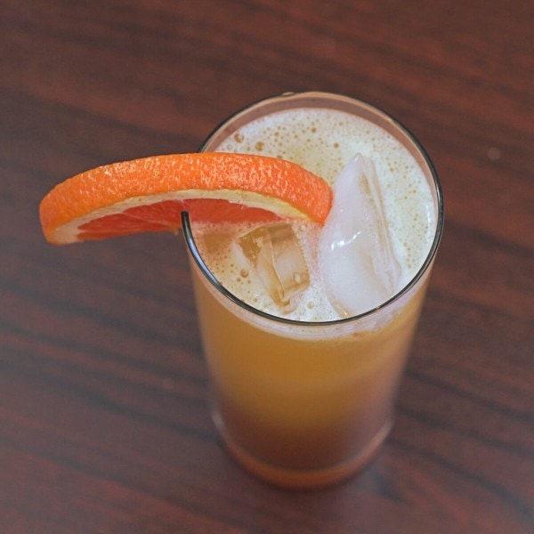 Overhead view of Executive Sunrise cocktail in tall glass