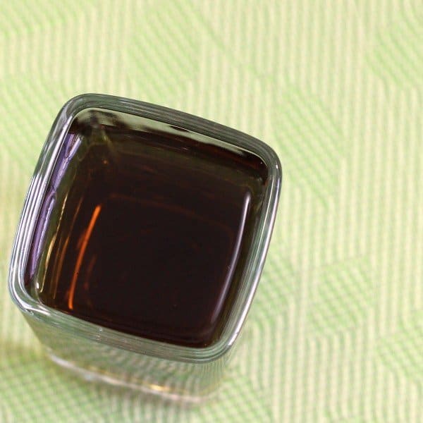 Overhead view of Fiery German drink in square glass