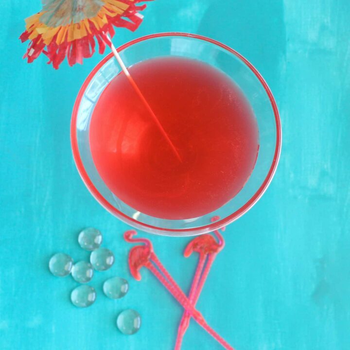 Overhead view of Flamingo Cocktail drink with cocktail umbrella
