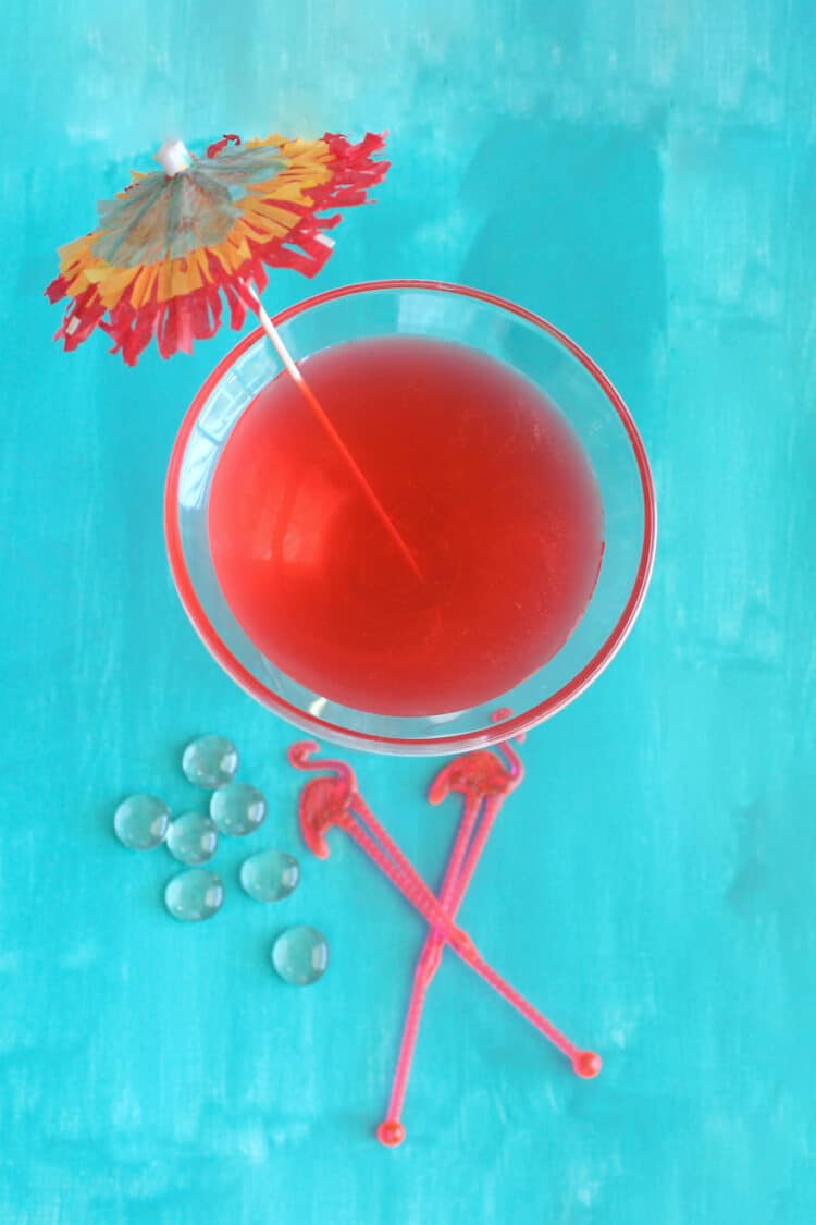 Overhead view of Flamingo Cocktail drink with cocktail umbrella