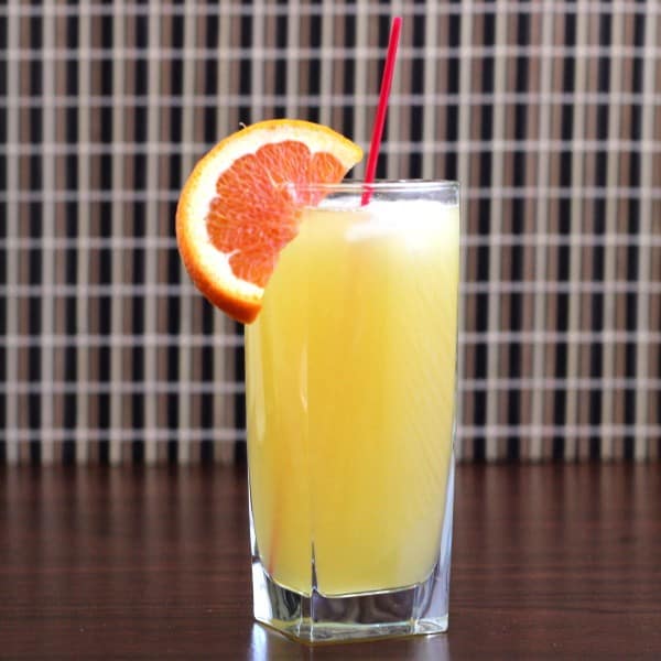 Full-length view of Flying Tiger drink with orange slice