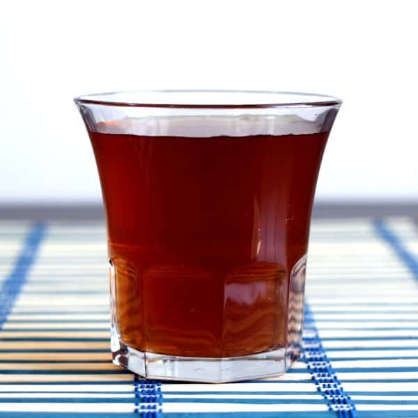 Forester drink in rocks glass on blue and white placemat