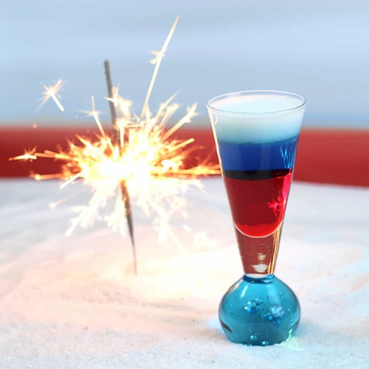 Now, here's a fun drink. The Fourth of July cocktail is a gorgeous layered shooter. It's pictured here with cream on top for a true red, white and blue look, but you can also layer cream vodka on top to make it stronger.