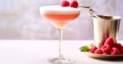 French Martini with raspberries in coupe glass