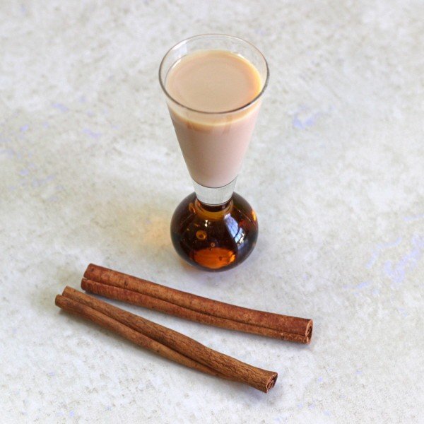 Overhead view of French Toast drink with cinnamon sticks