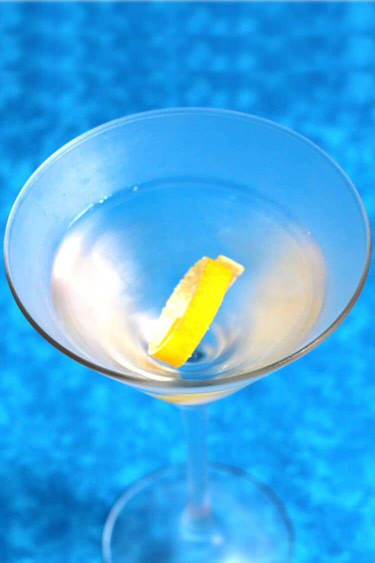 Overhead view of gin martini with lemon twist