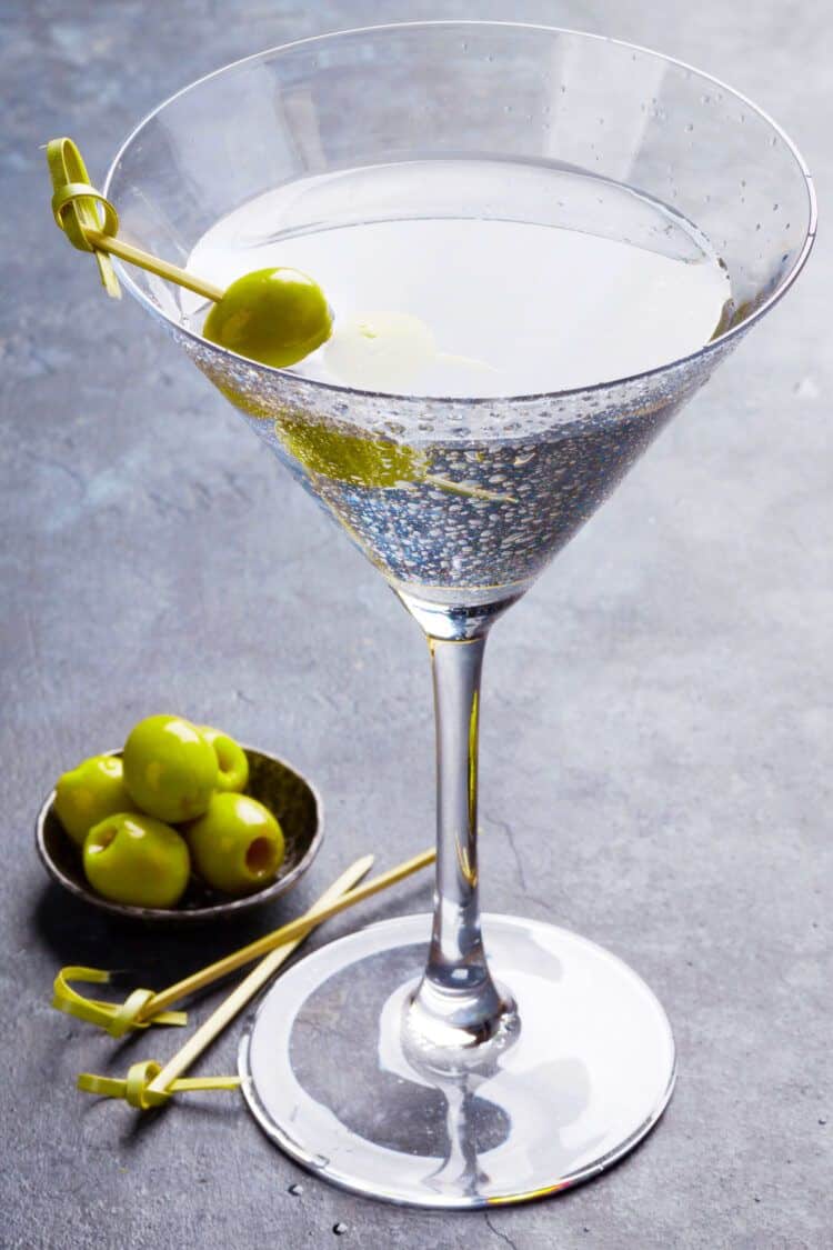 Gin martini with olive garnish