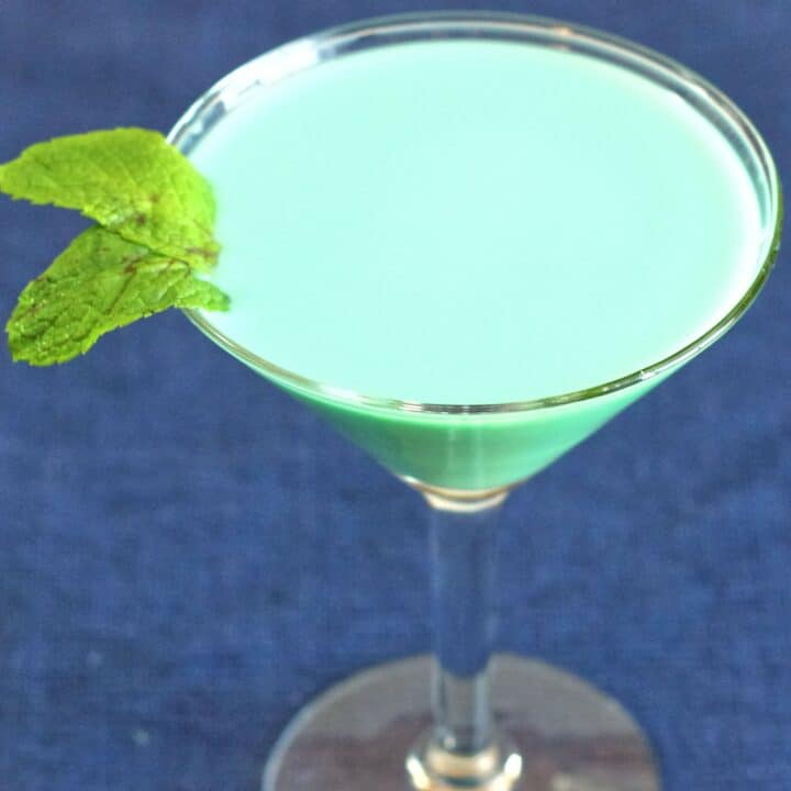 Creamy green Grasshopper drink with mint sprig