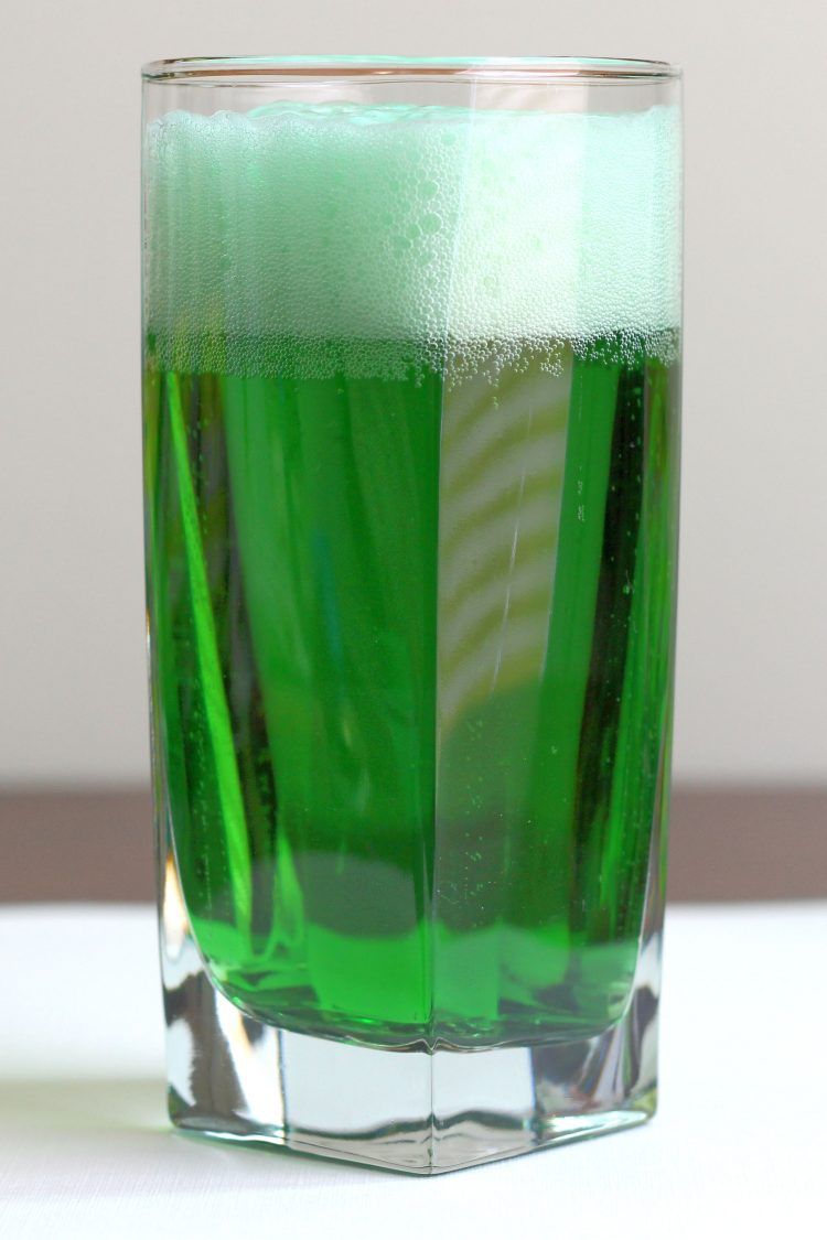 Green beer in glass