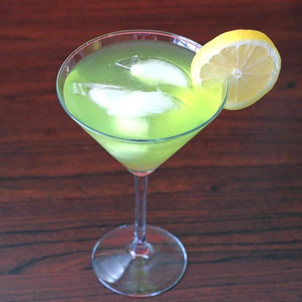 Overhead view of Green Dinosaur drink with lemon slice