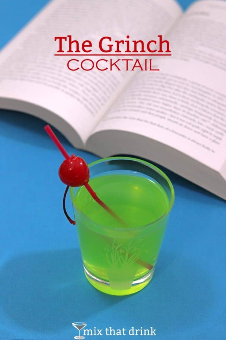 Bright green Grinch cocktail with cherry