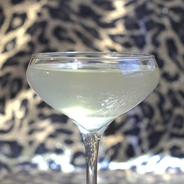 Closeup view of Harrovian cocktail in saucer