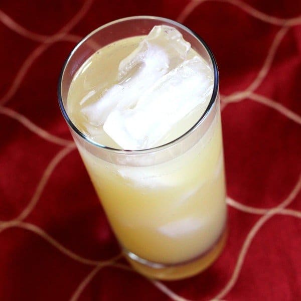 Tilted angle view of Harvey Wallbanger drink in tall glass