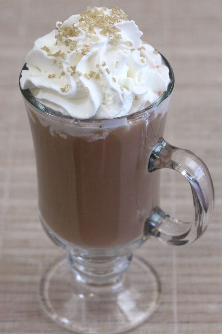 Overhead shot of Irish Coffee drink with whipped cream and sprinkles