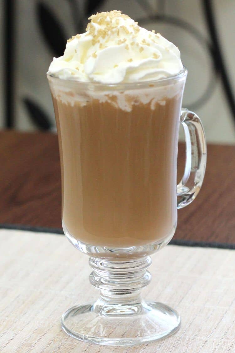 Irish Coffee drink with whipped cream on table