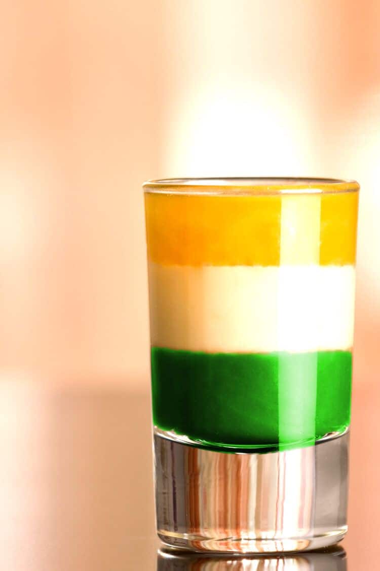 Irish Flag shot drink with layers of green, white and orange