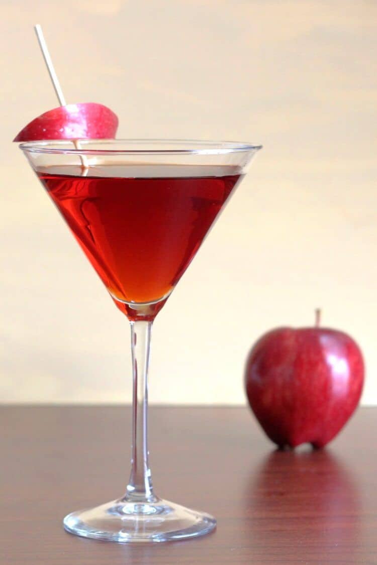 Jack Rose Cocktail beside apple