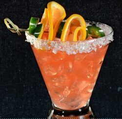 Jalepeno's Revenge Margarita with orange and jalapeno garnish