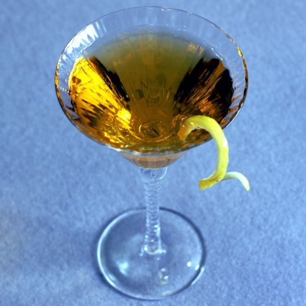 Tilted angle view of Loch Lomond drink with lemon twist