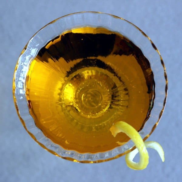 Overhead view of Loch Lomond drink with lemon twist