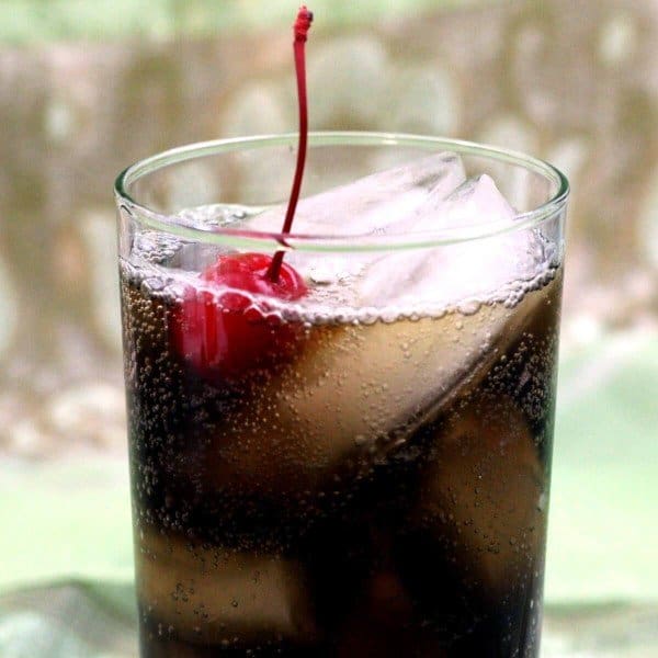 Closeup view of Mixy's Rum and Coke with cherry
