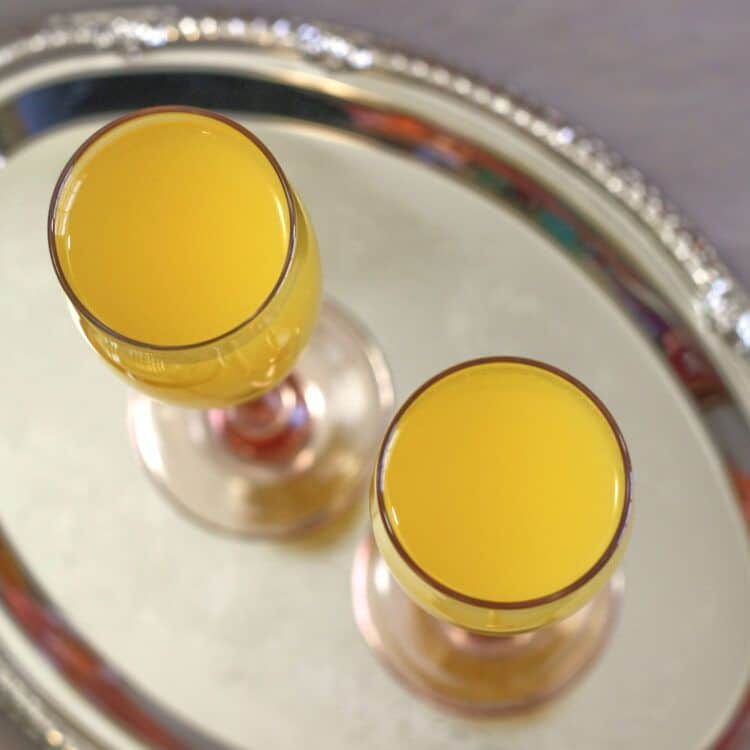 Two Mockmosa drinks on silver tray